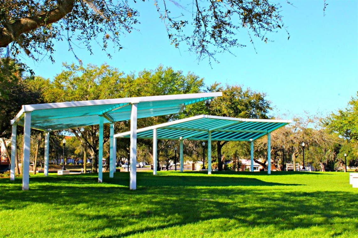 Grass field with Blue canopies